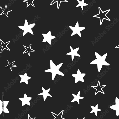 Star doodles seamless pattern. Hand drawn stars background texture.