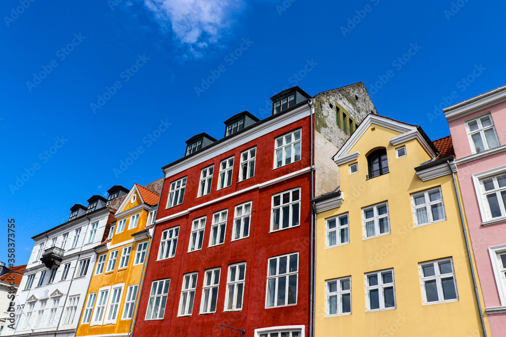 Nyhavn district in Copenhagen, the capital of Denmark. City center-panoramic view with beautiful colorful houses. Tourism in Denmark.