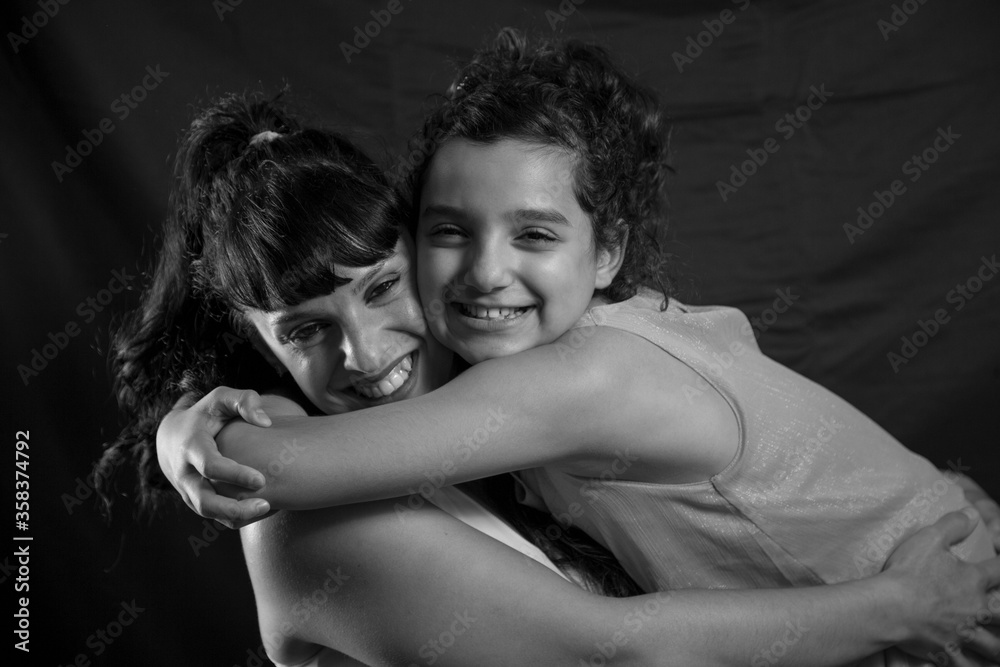Fototapeta premium Mother and daughter hugging.