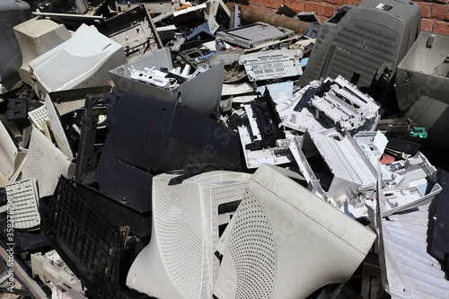 Old office equipment. Electronic waste devices consist of a monitor, printer, desktop computer and fax for reuse. Plastic, copper, glass can be reused, recycled or recycled