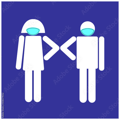 A couple greeting with the elbow instead of handshake. New greeting to respect social distance. Prevent Covid-19 wearing mask and keep social distancing. New normal greeting with elbow bump