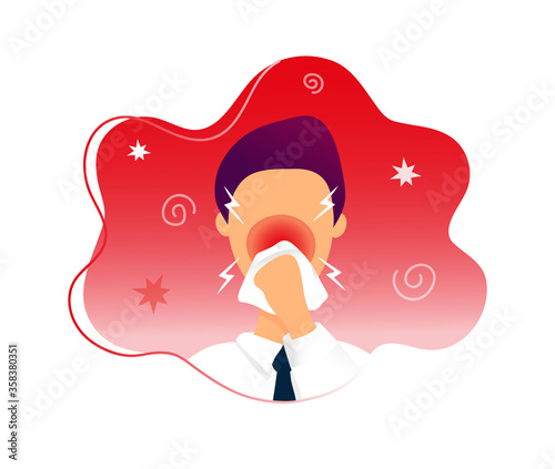 Man with rhinitis blowing his nose into napkin