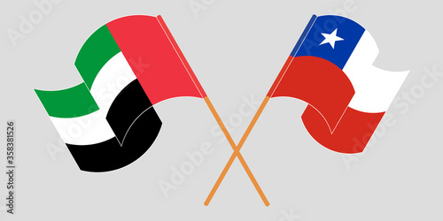 Crossed flags of Chile and the United Arab Emirates