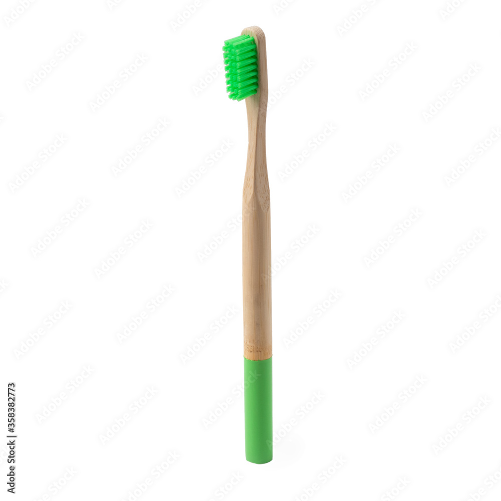 Toothbrush made of bamboo green bristles on a white background isolate. Concept Eco friendly, zero waste, recycling. Steps 4 out of 4 Toothbrush made of bamboo green bristles on a white background isolate. Concept Eco friendly, zero waste, recycling. Steps 4 out of 4
