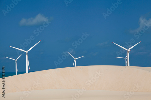 
wind power plant antennas in the dunes of Canoa Quebrada, Ceará, Brazil
