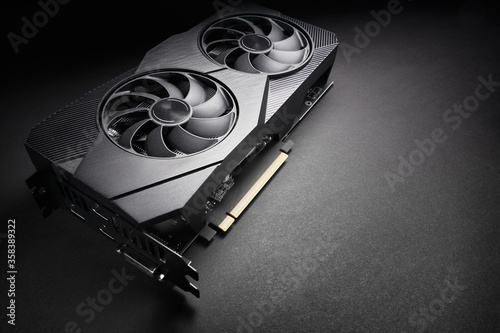 Fotografía modern black computer video card on a black background, deep shadows and contras