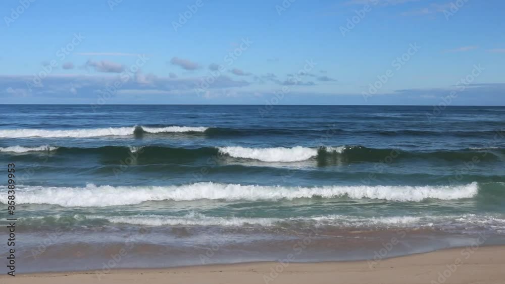 Crashing waves on the shore at Quaios beach, Portugal. Atlantic Ocean and sky view. Crashing waves on the shore at Quaios beach, Portugal. Atlantic Ocean and sky view.