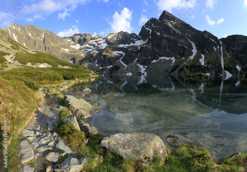 Obraz na płótnie Black Lake in Gasienicowa Valley just before sunset, Tatra Mountains, Poland w salonie