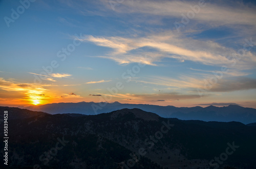 Beautiful mountain landscape with sunset over Taurus Mountains from the top of Tahtali Mountain near Kemer, Antalya, Turkey.  © Dmytro