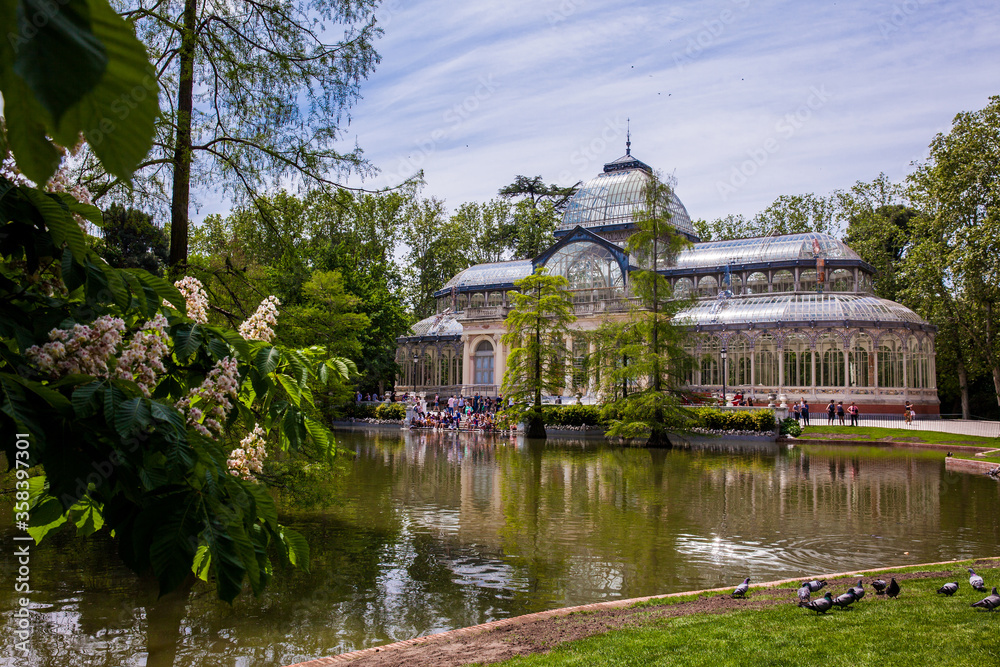 View of the beautiful Palacio de Cristal a conservatory located in El Retiro Park built in 1887 in Madrid