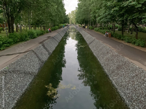 Reservoir in the city Park. Summer evening.