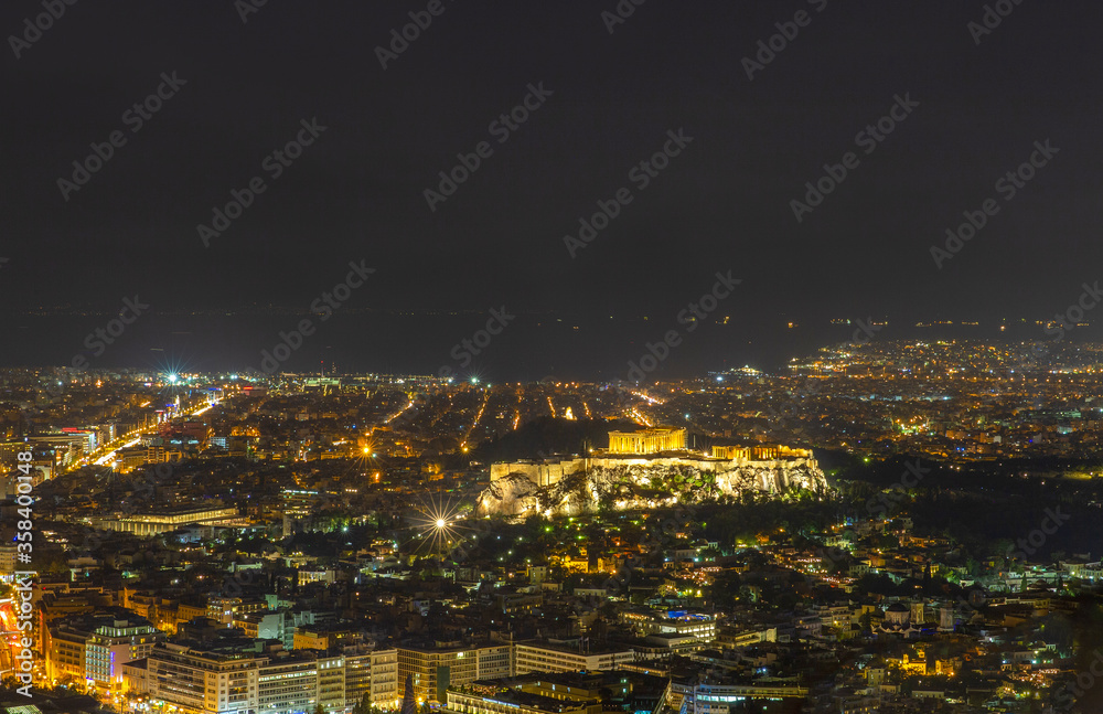 Acropolis of Athens at  night with street  illumination   view from Filothei Hill