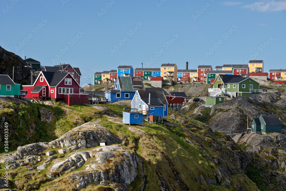 Colorful houses on rocky hill, Sisimiut (Holsteinsborg), West Greenland