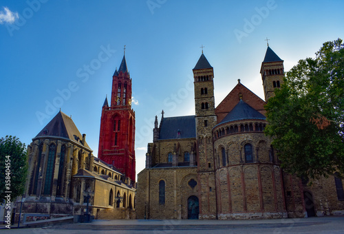 The ancient Vrijthof Square with the Saint Servatius Basilica and the St John Church , Maastricht, Limburg, Netherlands.