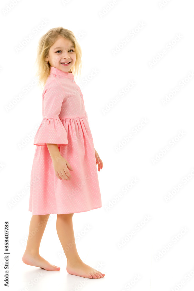 Full body length portrait of a beautiful girl in a dress Full body length portrait of a beautiful girl in a dress