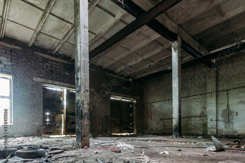 Old broken empty abandoned industrial building interior © Mulderphoto
