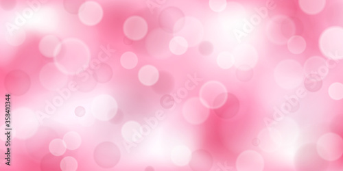 Abstract background with bokeh effects in pink colors