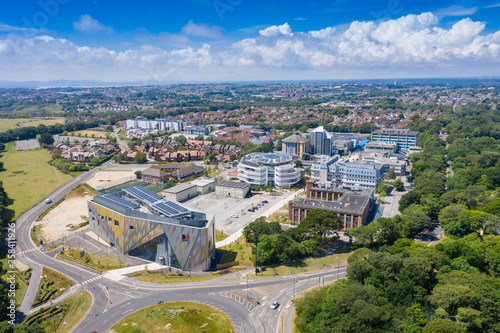 Aerial photo of the Bournemouth University, Talbot Campus buildings from above showing the Arts University Bournemouth, the Student Village, Fusion Building, Medical Centre photo