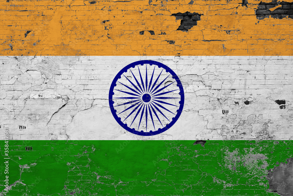 India flag on grunge scratched concrete surface. National vintage background. Retro wall concept.