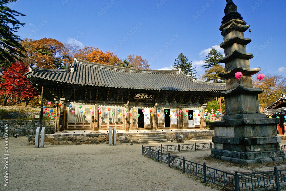 A stone pagoda stands in front of Daegwangbo-jeon hall at Magoksa Buddhist temple, Gongju, South Korea A stone pagoda stands in front of Daegwangbo-jeon hall at Magoksa Buddhist temple, Gongju, South Korea