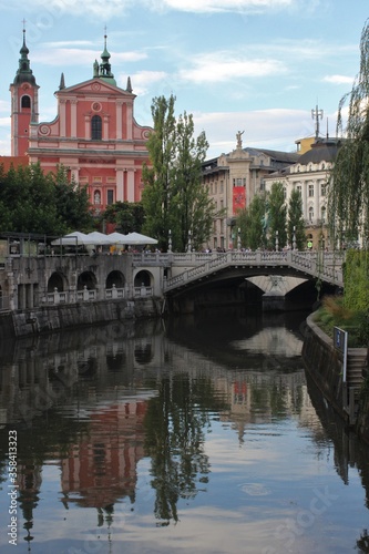 Church and bridge over the river in Ljubljana