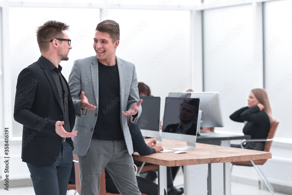 business man explaining his ideas to a colleague business man explaining his ideas to a colleague