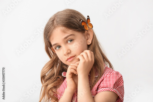 Cute little girl with butte...