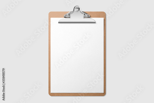 Real photo, wooden clipboard with blank A4 paper mockup template, isolated on light grey background. High resolution. photo