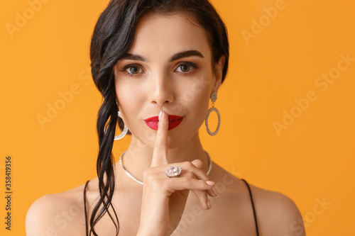Beautiful young woman showi...