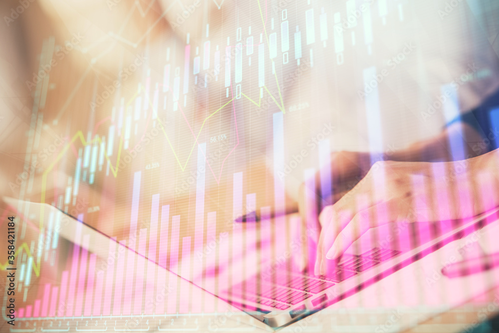 Double exposure of woman hands typing on computer and forex chart hologram drawing. Stock market invest concept.