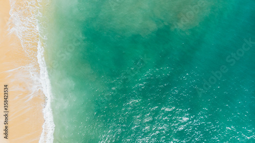 Coast as a background from top view. Turquoise water background from top view. Summer seascape from air.