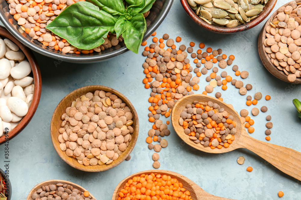 Different raw legumes on color background Different raw legumes on color background