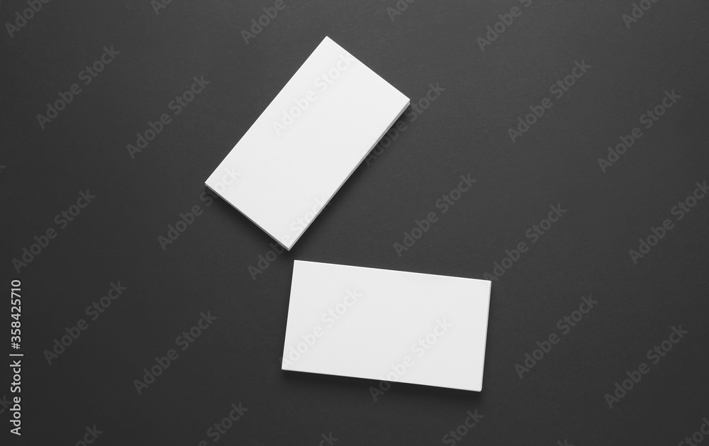 Blank business cards on dark background Blank business cards on dark background