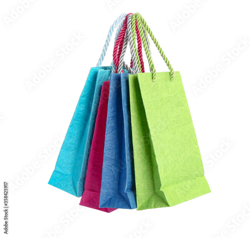 Paper shopping bags on white background