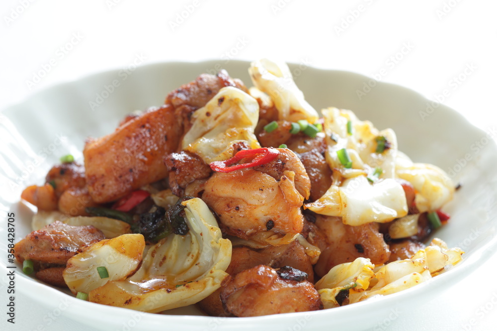 Korean food, chicken and cabbage stir fried with gochujang