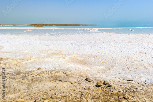 It s Dead Sea  also called the Salt Sea  is a salt lake bordering Jordan to the east and Israel and Palestine to the west.