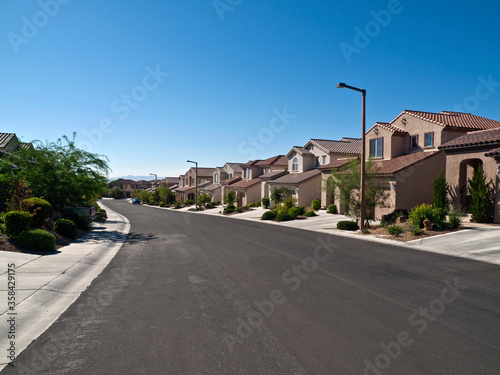 Typical street of suburban desert homes near Las Vegas Nevada.