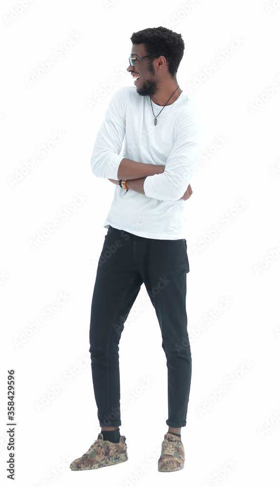 Fototapeta premium in full growth. young smiling man looking away