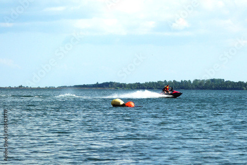 Sports water scooter ride on the lake