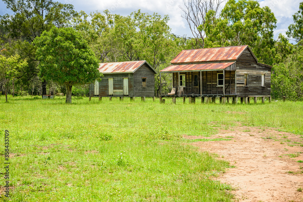 disused homestead in the middle of a green field in Kroombit Tops National Park, Queensland disused homestead in the middle of a green field in Kroombit Tops National Park, Queensland