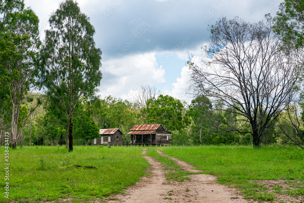 disused homestead in the middle of a green field in Kroombit Tops National Park, Queensland disused homestead in the middle of a green field in Kroombit Tops National Park, Queensland