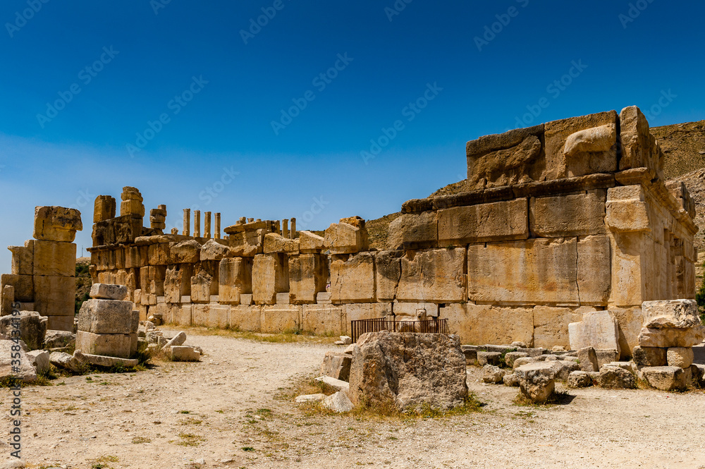 It's Ruins of the Qasr al Abd, a large ruin in Iraq Al Amir, Jordan.