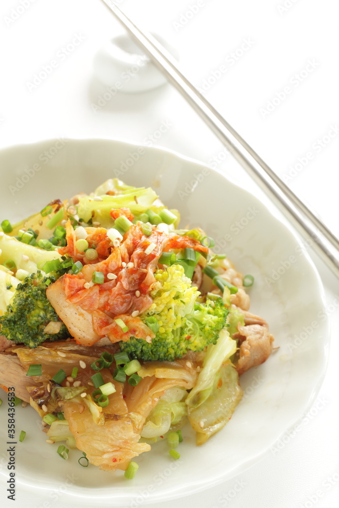 Korean food, broccoli and kimchi stir fried with cabbage and pork Korean food, broccoli and kimchi stir fried with cabbage and pork
