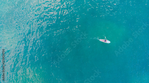 Coast as a background from top view. Turquoise water background from top view. Summer seascape from air. © ALEXSTUDIO