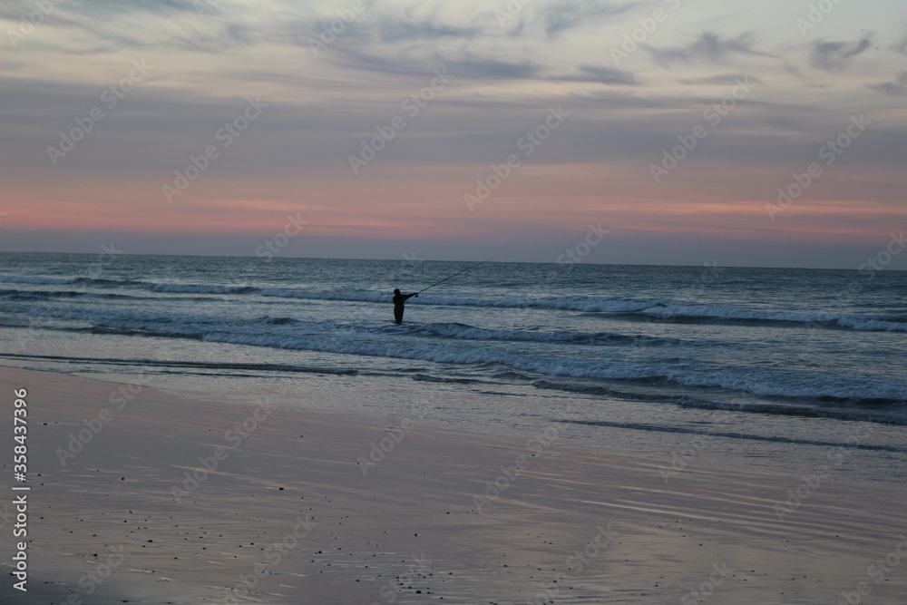 Man Fishing in the Sea