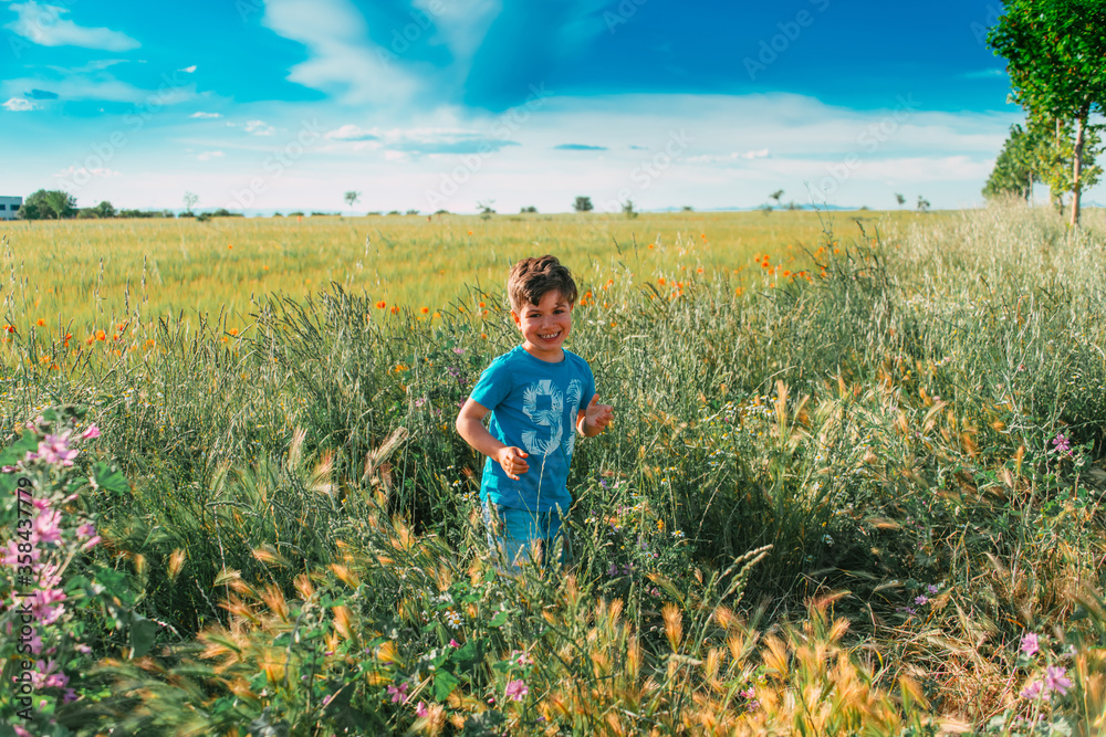 Fototapeta premium happy child strolling through nature in the new normal without technology