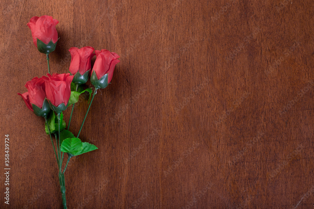 A roses on the wooden Background