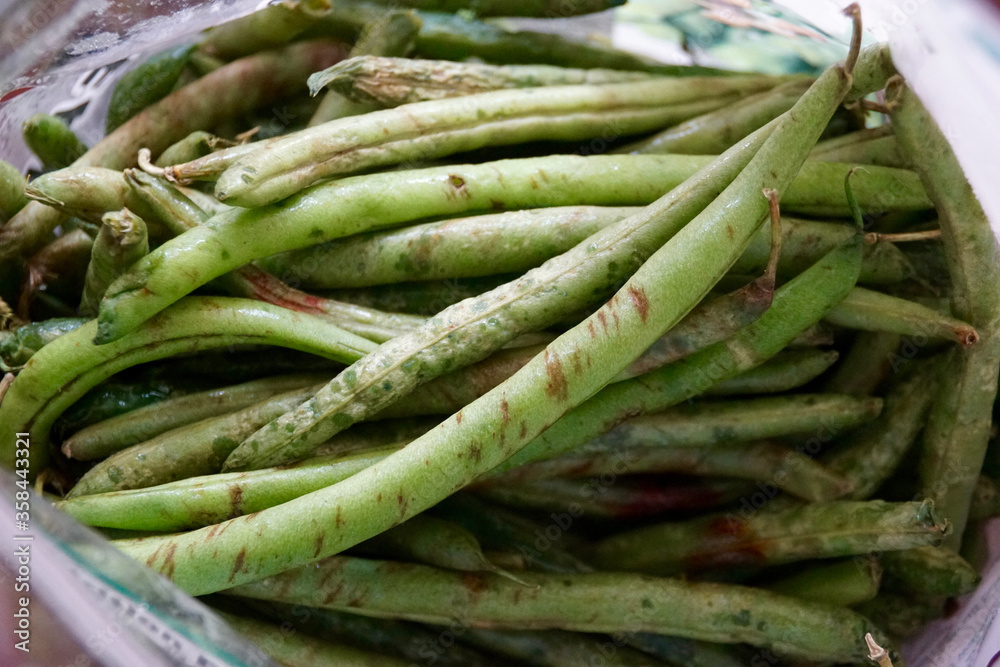 Close up of rotten green beans in a pile Close up of rotten green beans in a pile