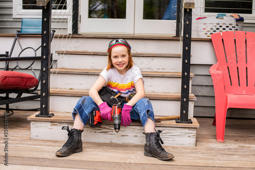 Young girl with power tools