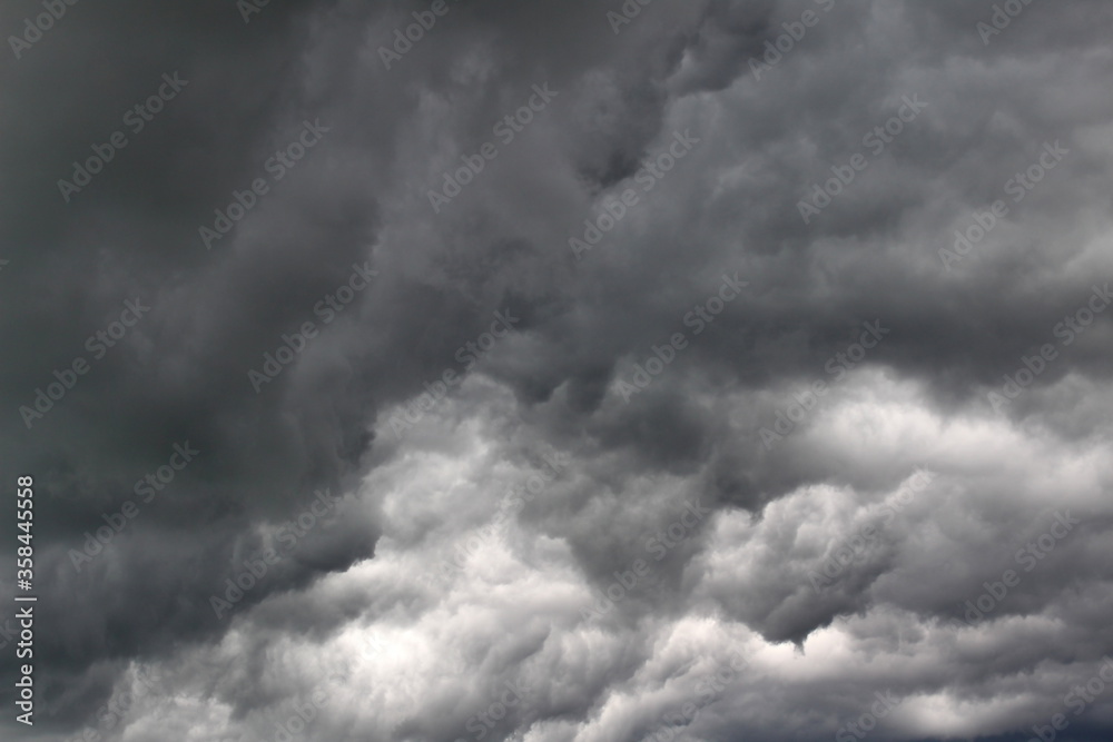 Dark clouds before the rain covered the whole sky Dark clouds before the rain covered the whole sky